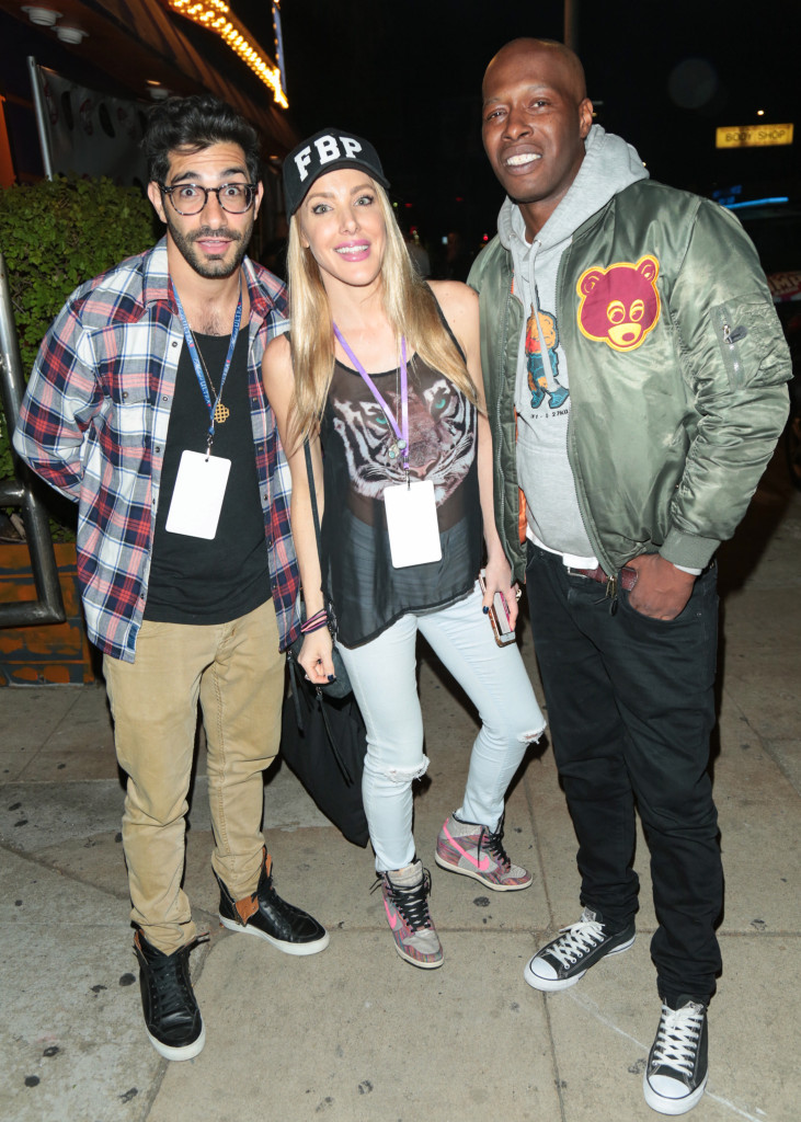 Fuquan Johnson (right) is seen with Kate Quigley (center) in Los Angeles on May 15, 2018. GC Images